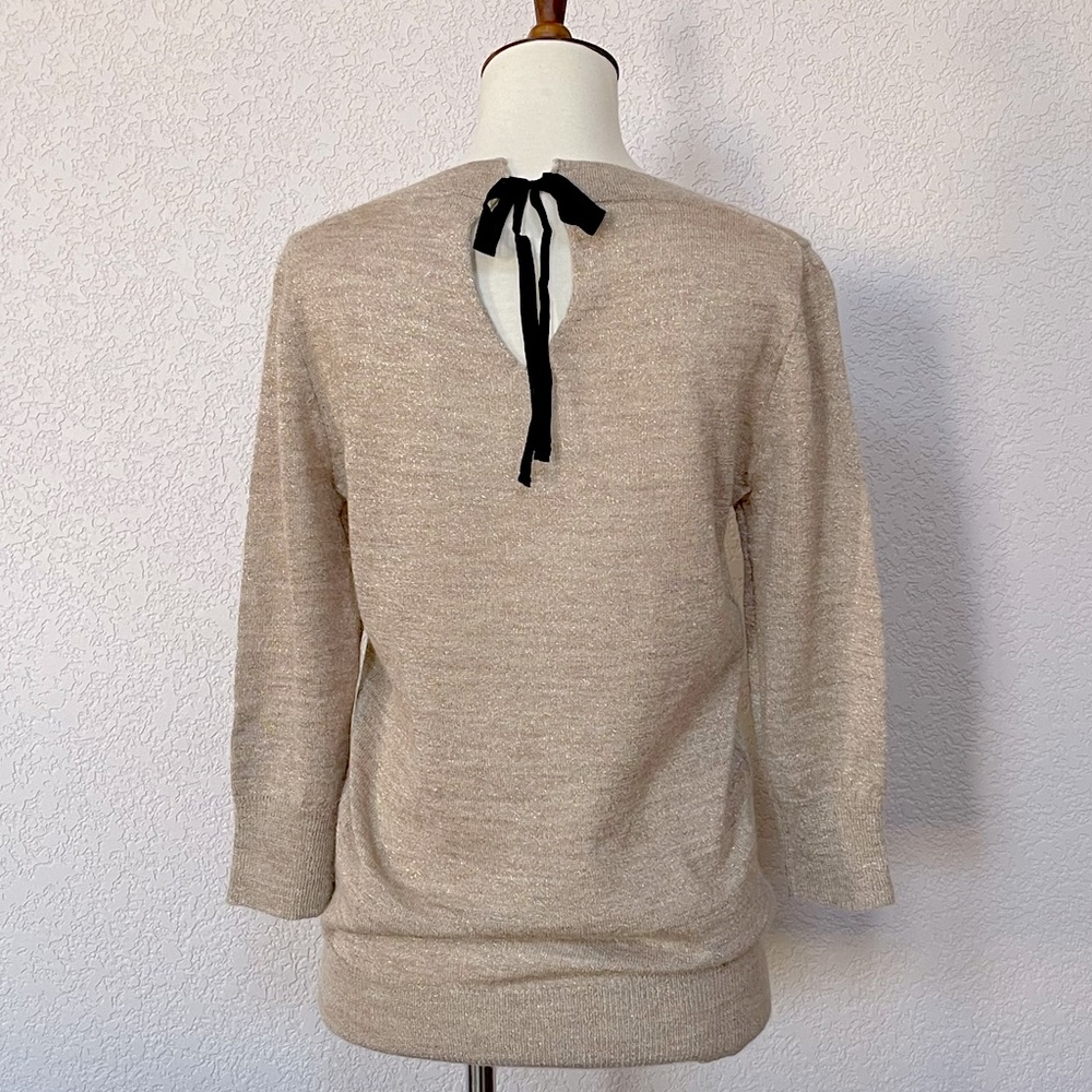 J. Crew shimmery metallic gold sweater with 3/4 sleeves and black keyhole tie